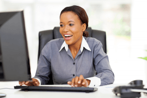 A woman manager studying in an employment law training webinar.