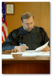 A judge looking at papers.